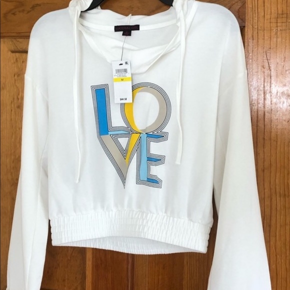 Material Girl Tops - GROOVY BELL SLEEVE SWEAT.
